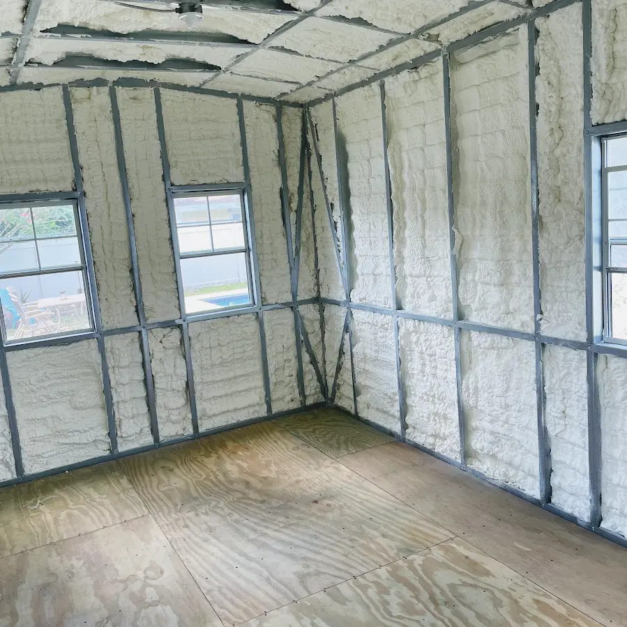 Closed-cell spray foam insulation applied to wall cavities in a residential project in Jefferson Hills